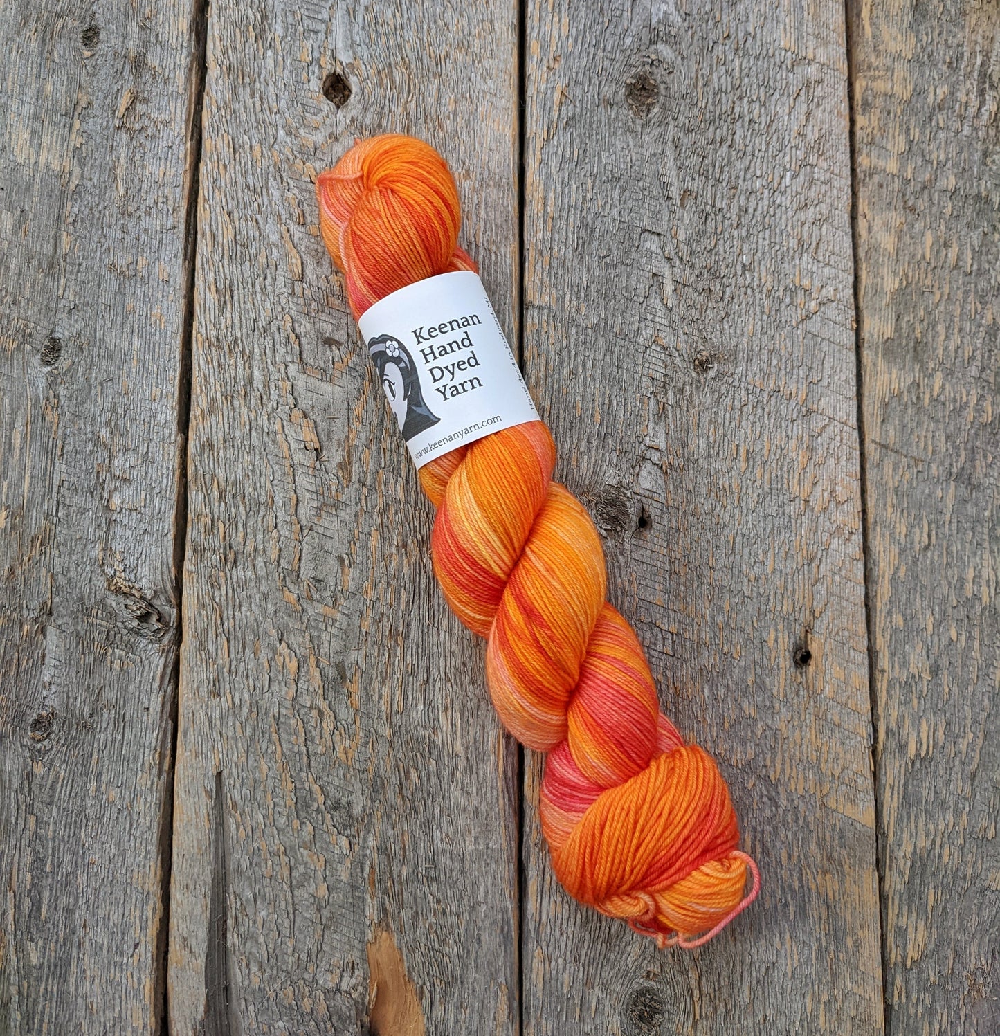 orange hand dyed yarn, sock yarn, twisted skein, Keenan hand dyed, merino yarn, wool yarn, merino nylon yarn