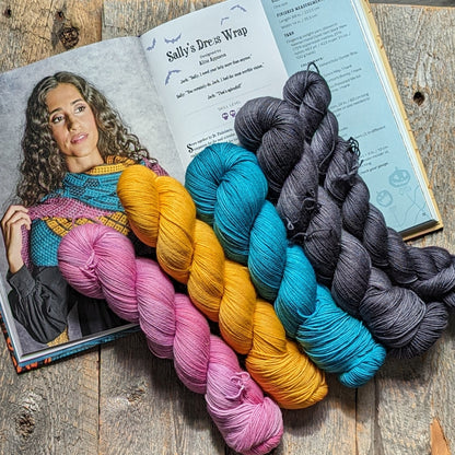 pink hand dyed yarn, yellow hand dyed yarn, teal hand dyed yarn, black hand dyed yarn, Sally's Dress Wrap