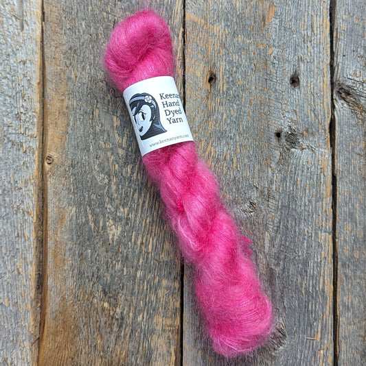 magenta colored yarn, speckled yarn, yarn, lace yarn, twisted skein, silk mohair yarn