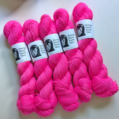 5 skeins neon pink sock yarn