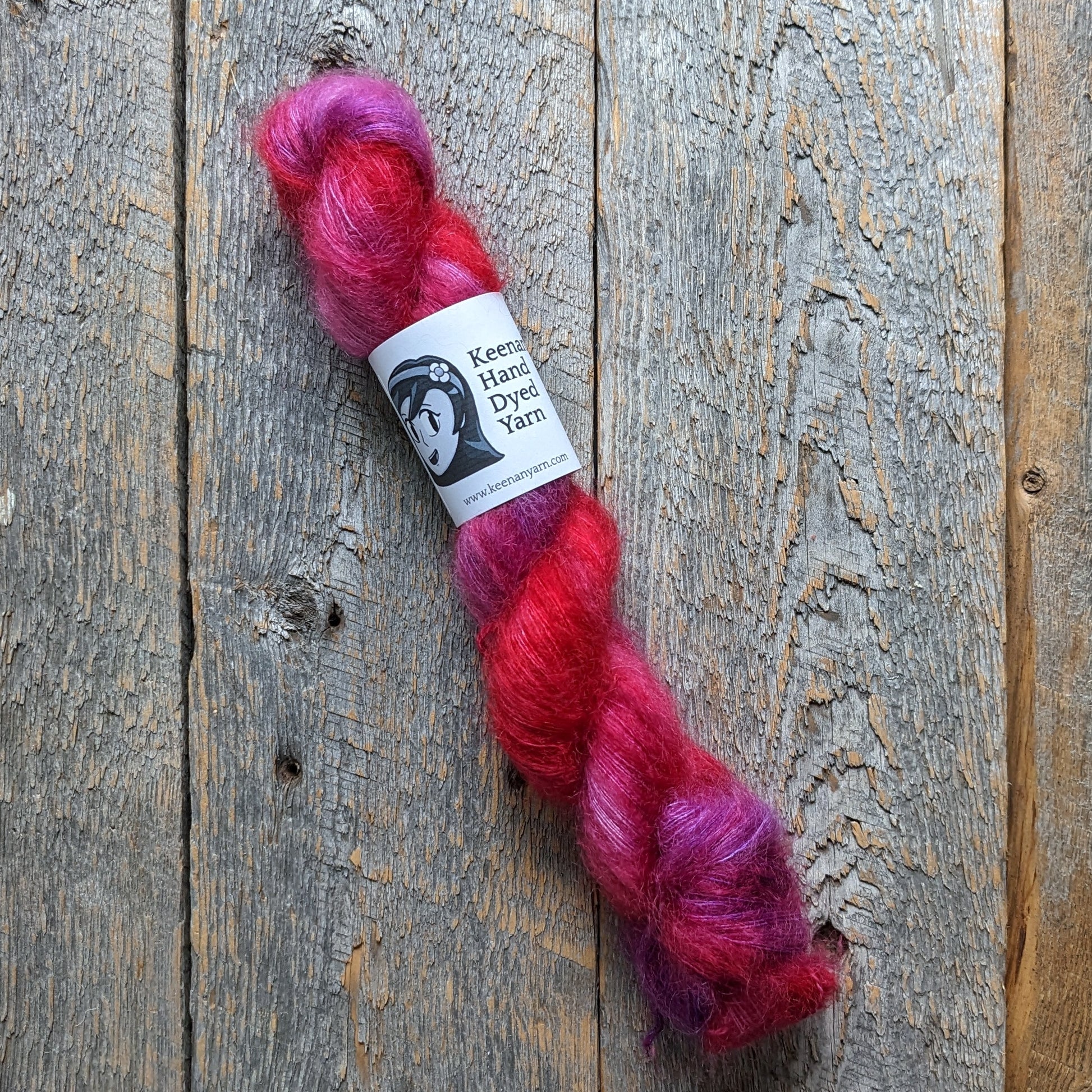 red purple colored yarn, lace yarn, twisted skein, silk mohair yarn, Keenan hand dyed