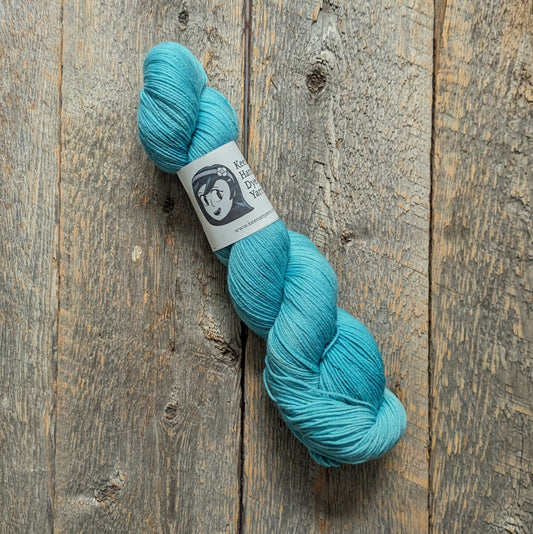 light teal hand dyed yarn, sock yarn, twisted skein, Keenan hand dyed, merino yarn, wool yarn, merino nylon yarn