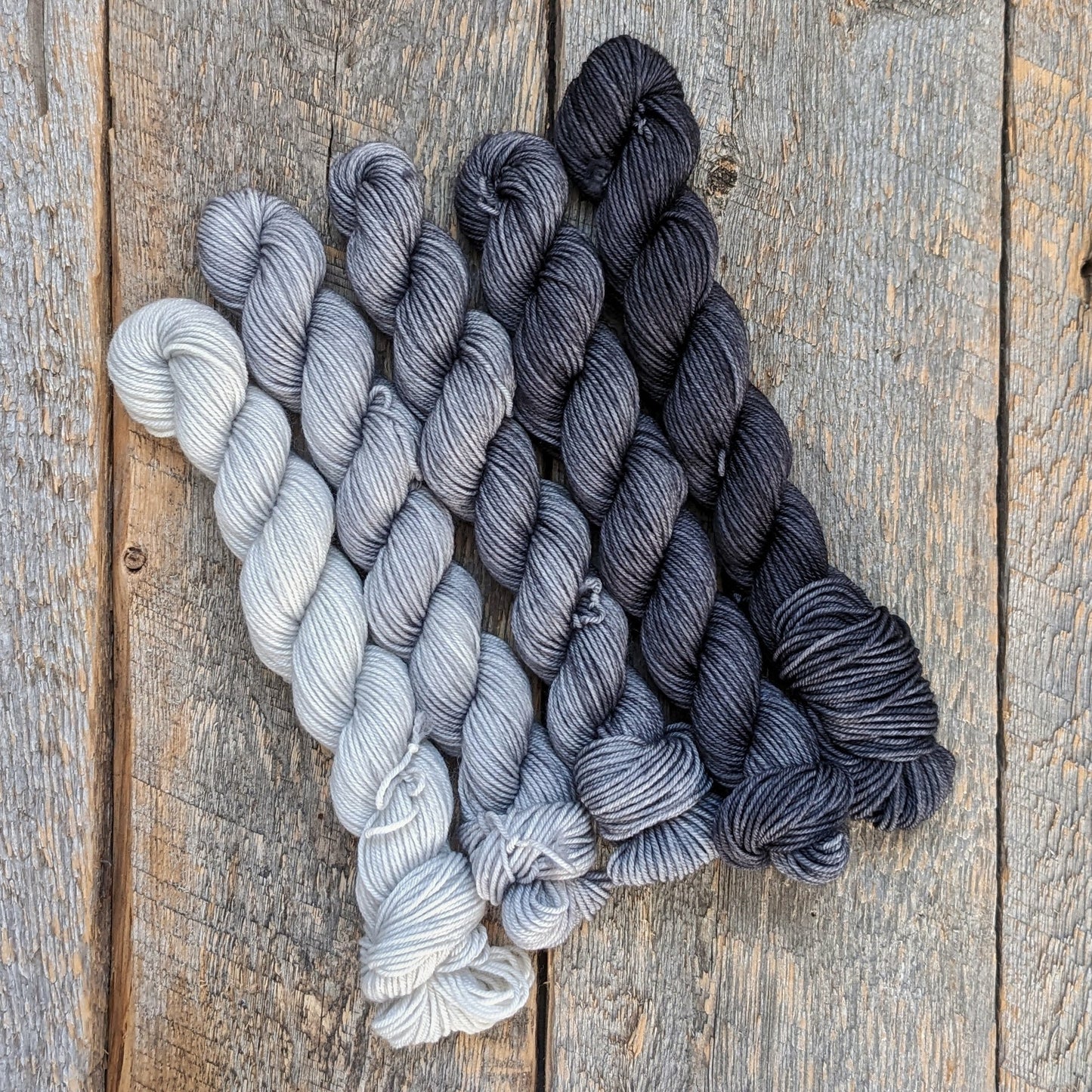 gradient mini set, gray yarn, black yarn, ansel adams gradation, mini skeins, twisted mini skeins, sock yarn, fingering yarn, black hand dyed yarn, gray hand dyed yarn
