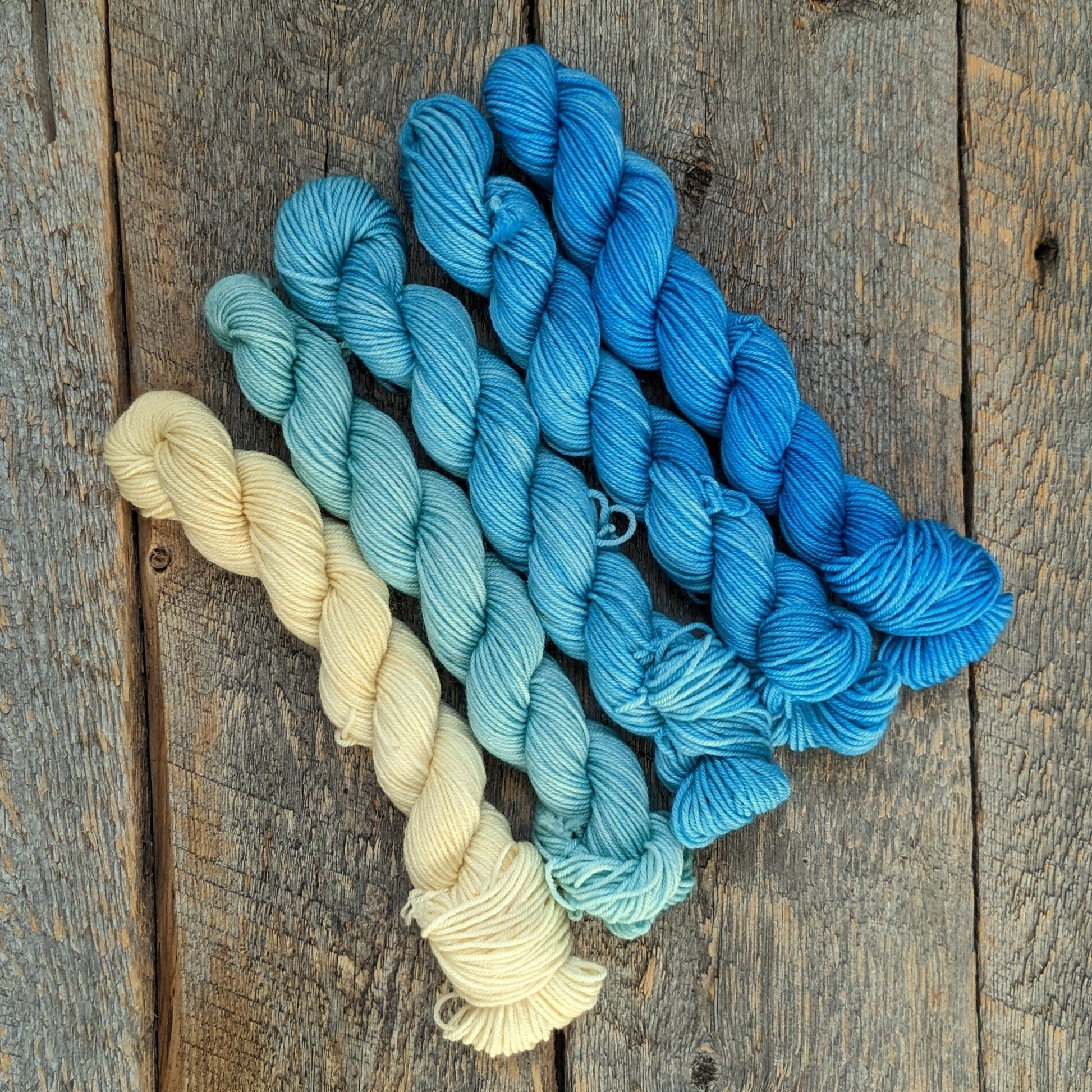 twisted mini skeins, mini skien, sand yarn, lake blue yarn, fingering yarn, sock yarn, sand colored yarn, blue hand dyed yarn