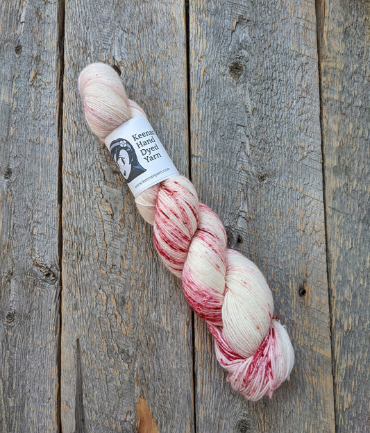 red and pink speckled yarn, hand dyed yarn, sock yarn, twisted skein, Keenan hand dyed, merino yarn, wool yarn, merino nylon yarn