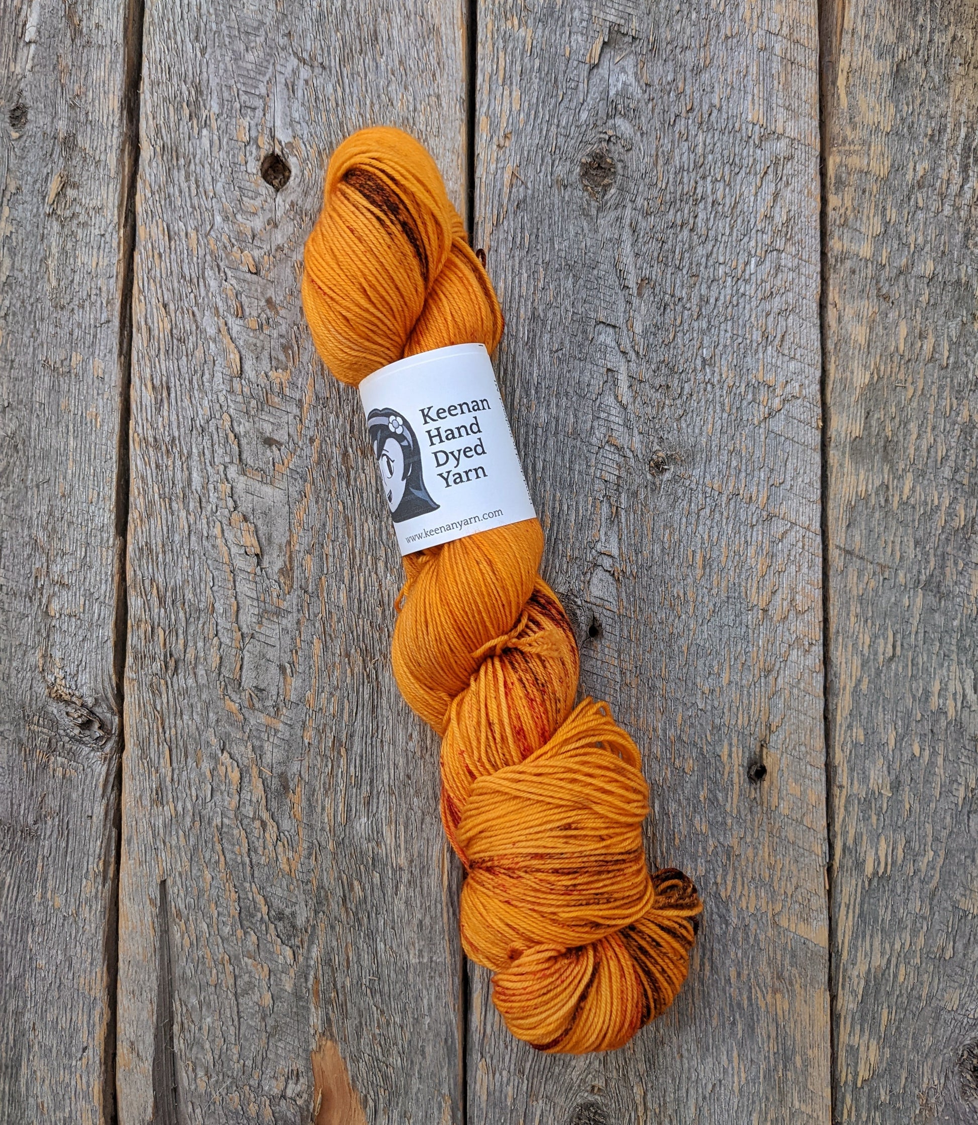 orange hand dyed yarn with brown speckles, sock yarn, twisted skein, Keenan hand dyed, merino yarn, wool yarn, merino nylon yarn