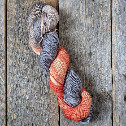 gray hand dyed yarn, orange hand dyed yarn, sock yarn, twisted skein, Keenan hand dyed, merino yarn, wool yarn, merino nylon yarn