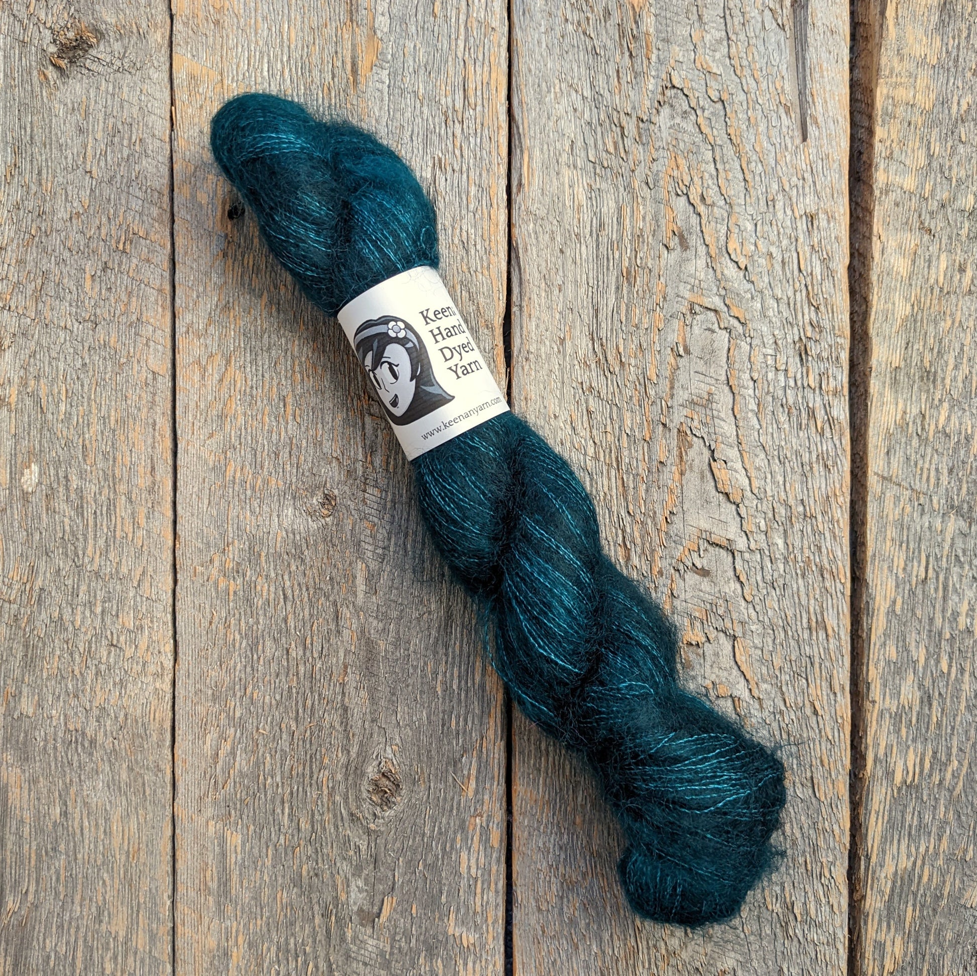 dark teal colored yarn, speckled yarn, yarn, lace yarn, twisted skein, silk mohair yarn, Keenan hand dyed